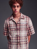 Pink leather button-up shirt with vintage rose design from GUAPI CLOTHING, featuring classic collar and long sleeves.