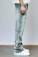 First Row Allover Rhinestone flare fit denim jeans in medium stone tint with rhinestone embellishments and classic denim styling.
