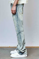 First Row allover rhinestone flare fit denim jeans in medium stone tint, showcasing sparkling embellishments and stylish fit.