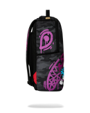 Sprayground Smurfs Shark Tag backpack accessory featuring a colorful shark design on a durable fabric background.
