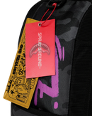 Sprayground Smurfs Shark Tag backpack featuring a vibrant shark design and playful accessories on a colorful, durable bag.