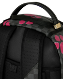 Sprayground Disney Alice in Wonderland Cheshire Cat Mad Shark backpack with colorful, playful design and adjustable straps.