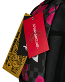 Sprayground Disney Alice in Wonderland Cheshire Cat Mad Shark backpack featuring colorful cartoon shark design and adjustable straps.