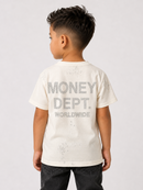 A young boy viewed from the back wearing a cream-colored t-shirt with a distressed gray graphic that reads 'MONEY DEPT. WORLDWIDE'.