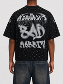 Black Rare Peace Bad Habits oversized rhinestone cropped T-shirt, shown from the back with fitted style and decorative rhinestone details.