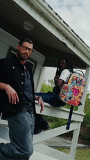 Sprayground Collage Of Fun backpack, colorful accessories bag with vibrant collage design, displayed at Arden Fair Mall in Sacramento.